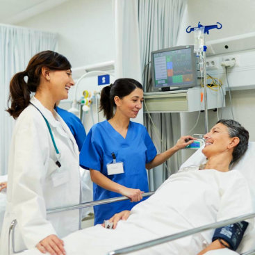 patient talking to the doctor and nurse